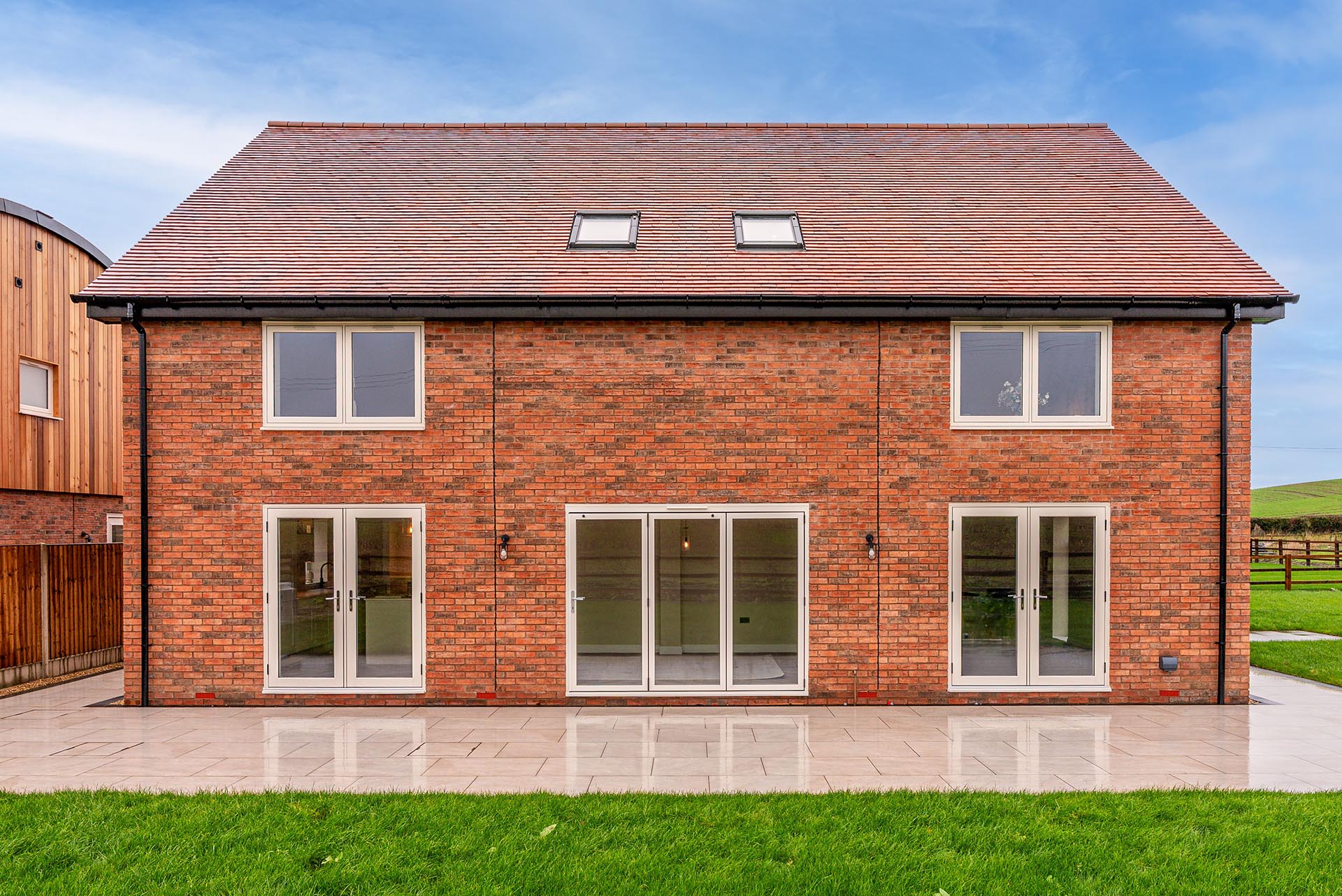 brown antique tiles on a high ened new build by Jarvis Construction